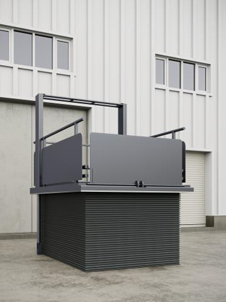 A sizeable scissor platform lift located outside a building